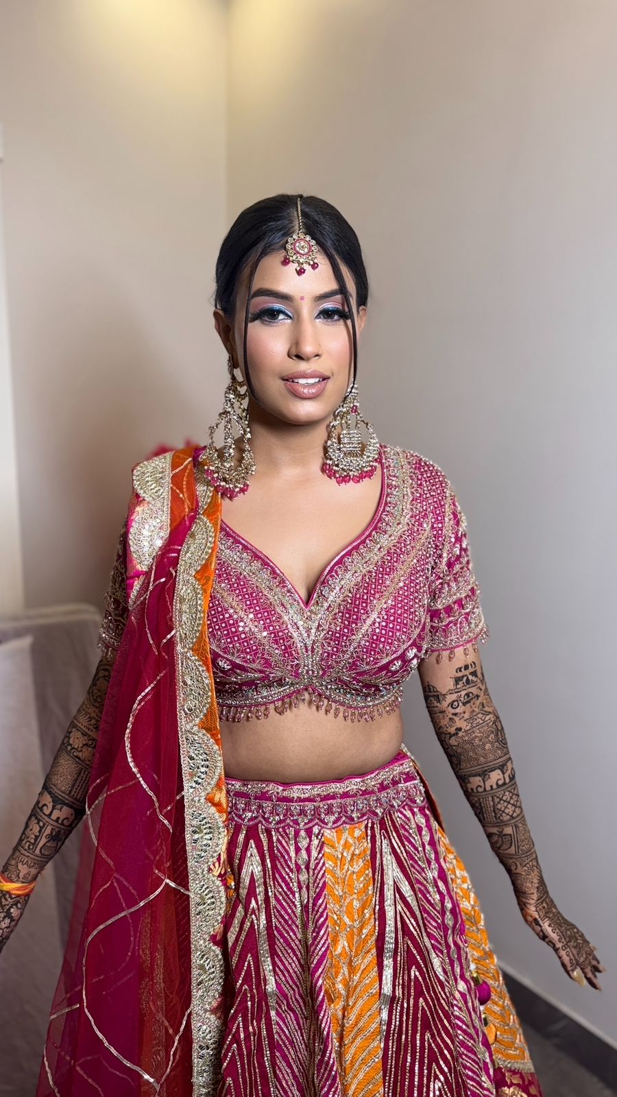 Mehndi ceremony makeup Ghaziabad by Ritika Verma — vibrant dewy finish, waterproof formula