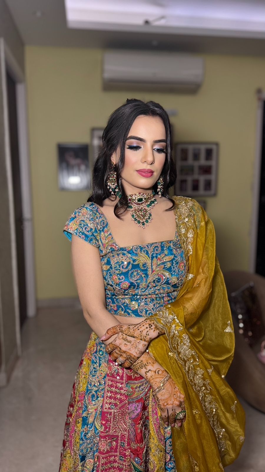 Haldi ceremony makeup Meerut by Ritika Verma — radiant golden skin, lightweight sweat-resistant formula, traditional yellow lehenga look